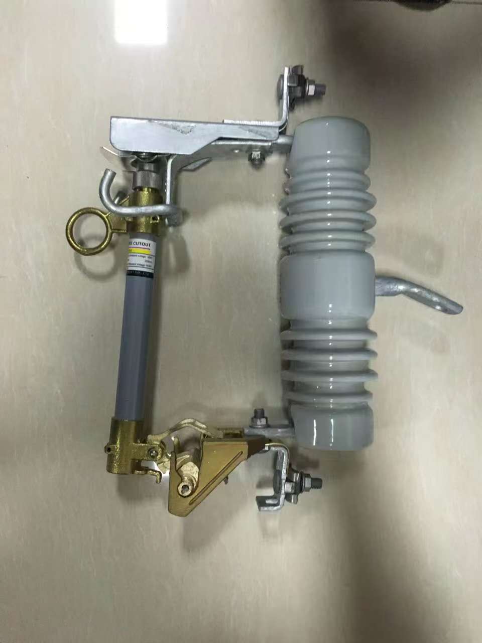 Porcelain Drop-Out Fuse Cutout (Side View) - Distribution Line Material | Acharya H.P.L overseas